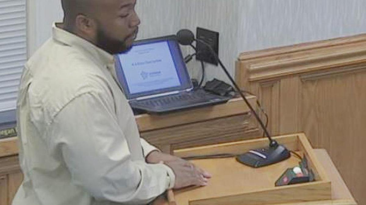 Dwight Chandler addresses the Durham Public Schools Board of Education meeting on Oct. 26 concerning DPS’ handling of his child’s education and work history.