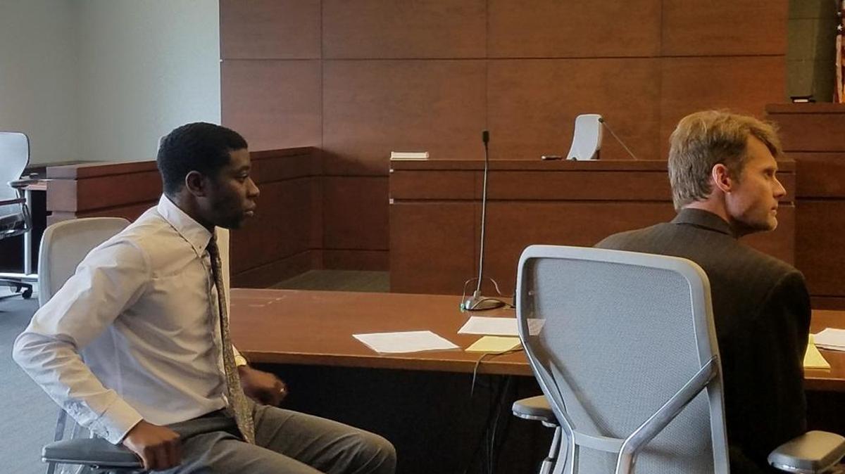 Le’Andre Blakeney, left, and his attorney Scott Holmes in Durham County District Court on Monday, Aug. 7, 2017. Blakeney and four others were arrested during a protest over the county jail at a Durham County commissioners meeting.