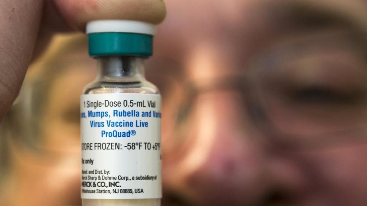 Orange County’s Health Department has recently identified three confirmed cases of mumps. In this 2015 file photo, a pediatrician holds a dose of the measles-mumps-rubella (MMR) vaccine at his practice in Northridge, Calif.