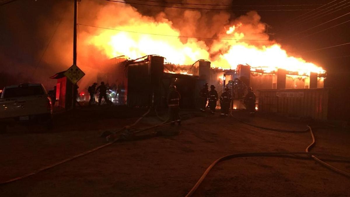 Durham firefighters battled a two-alarm blaze on Friday night that destroyed a building at the East End Connector construction site near US 70.