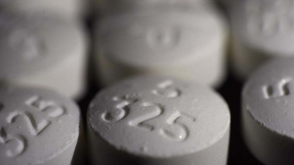 An arrangement of the opioid oxycodone-acetaminophen pill is pictured in this photo illustration.