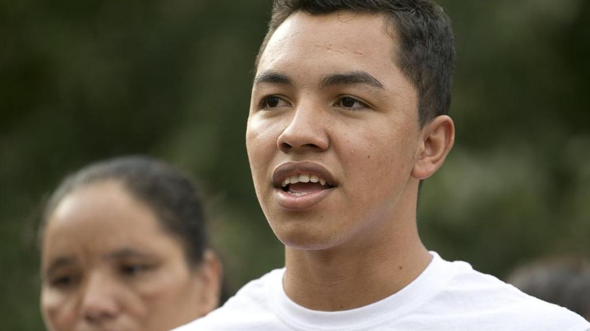 Wildin Guillen Acosta awaits his introduction at a news press conference on Aug. 29, 2016 in Durham. Acosta was a student at Riverside High School in Durham when he was arrested in January 2016. He entered the United States illegally and faces deportation to Honduras.