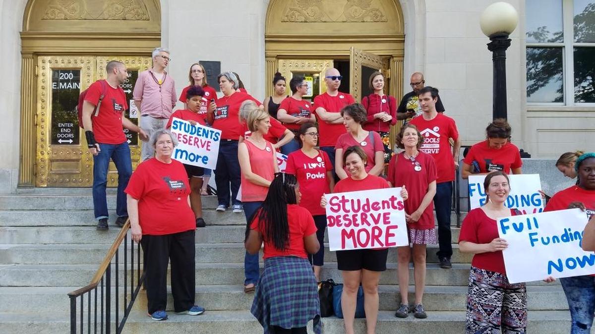 The Durham Association of Educators and others prepare for a press conference before the Durham County commissioners budget hearing. The association asked the county to fully fund Durham Public Schools Board of Education request for $11 million more in funding.