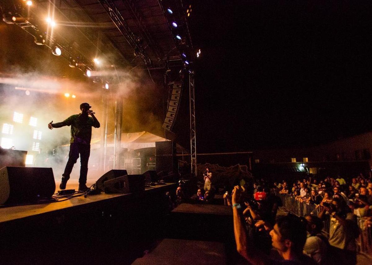 Talib Kweli performs at Motorco Park Thursday night.