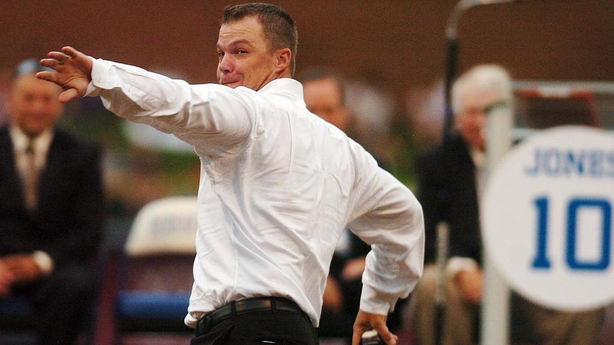 Former Durham Bulls player Chipper Jones throws out the first pitch during a a day honoring him at Durham Bulls Athletic Park on Aug. 20, 2013.