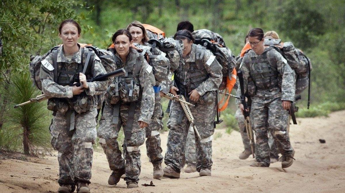 Female soldiers carry out a ruck march, or exercise in full military gear, at Fort Bragg, N.C. The Durham VA Medical Center and Dress for Success Triangle NC will hold “Writing to Heal: A Veteran’s Perspective,” from 9 to 11 a.m. Saturday, July 15, in the medical center atrium.