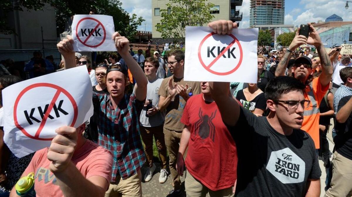 Several hundred protesters are pictured in downtown Durham on Aug. 18 in anticipation of a rumored march by the Ku Klux Klan in Durham. The march never took place but two people have now been arrested for bringing weapons to the event.