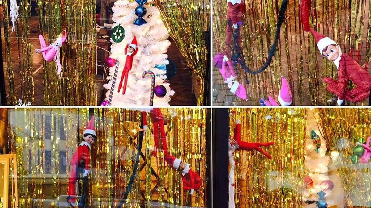 Rock Paper Scissors Salon took top honors in the first Downtown Durham holiday window decorating contest.