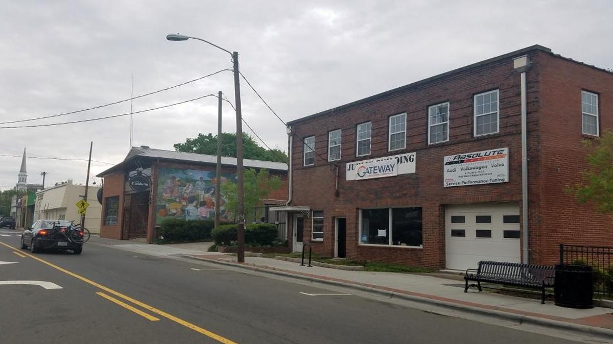 The City Council approved a $100,000 economic incentive for a project to transform an automotive building at 1105 W. Chapel Hill Street, right, into a banquet hall and offices for a production company and nonprofit organization.