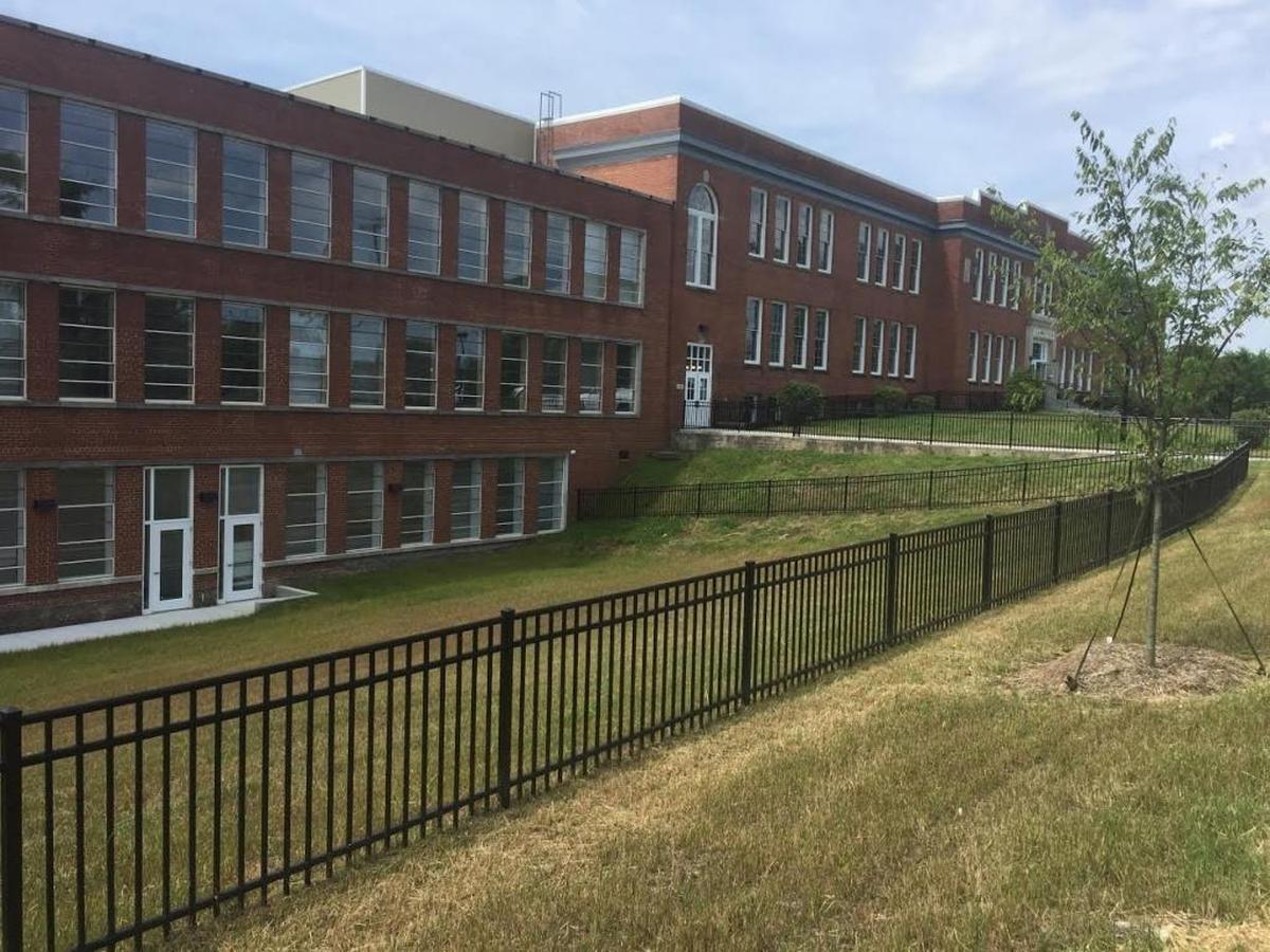 This file photo shows the front of the old Whitted School building facing East Umstead Street. The facility now has 79 affordable apartments for seniors.