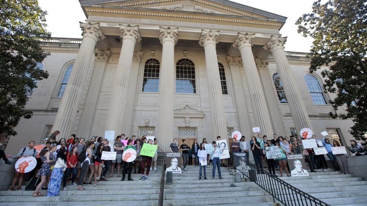 Students and others took turns speaking out against the hiring of UNC system president Margaret Spellings outside Wilson Library on the Chapel Hill campus in this March 1, 2016, file photo.