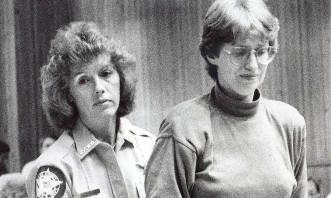 A Lee County deputy sheriff leads Barbara Stager out of the courtroom in 1989 after Stager was given the death penalty for the murder of her second husband, Russ Stager.