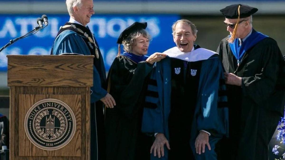 Journalist Charlie Rose, a Duke University graduate receives an honorary degree, third from left, from the university in Durham on May 15, 2016.