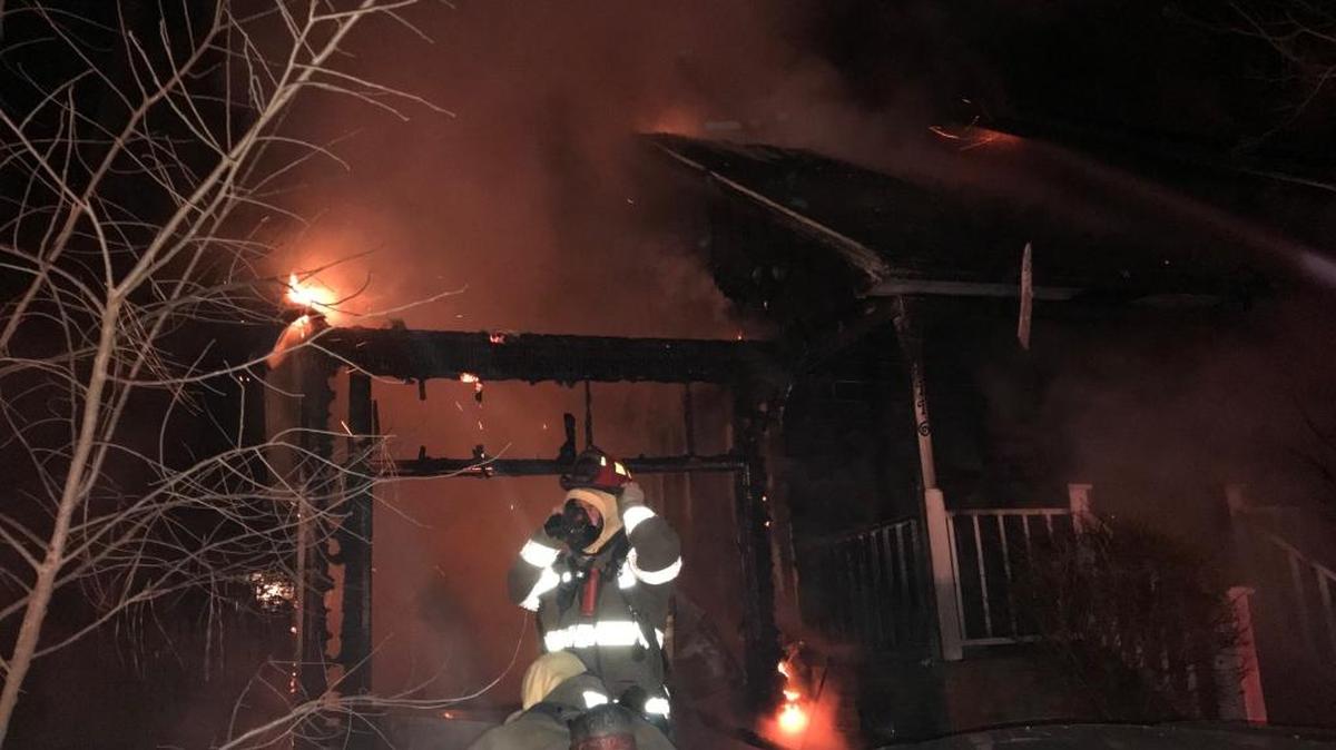 Durham firefighters respond to a home blaze at 4117 Olde Coach Road Tuesday evening.