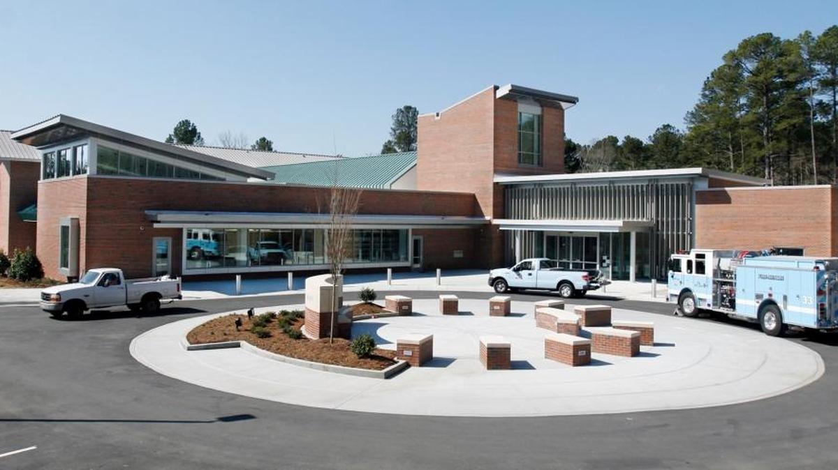 This 2013 file photo shows the front exterior and traffic circle of the Chapel Hill Public Library. The library is in Pritchard Park, which will undergo a controlled burn in the spring.