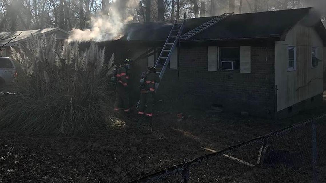 A residence located at 3611 Four Seasons Dr. in Durham smokes from an internal fire.