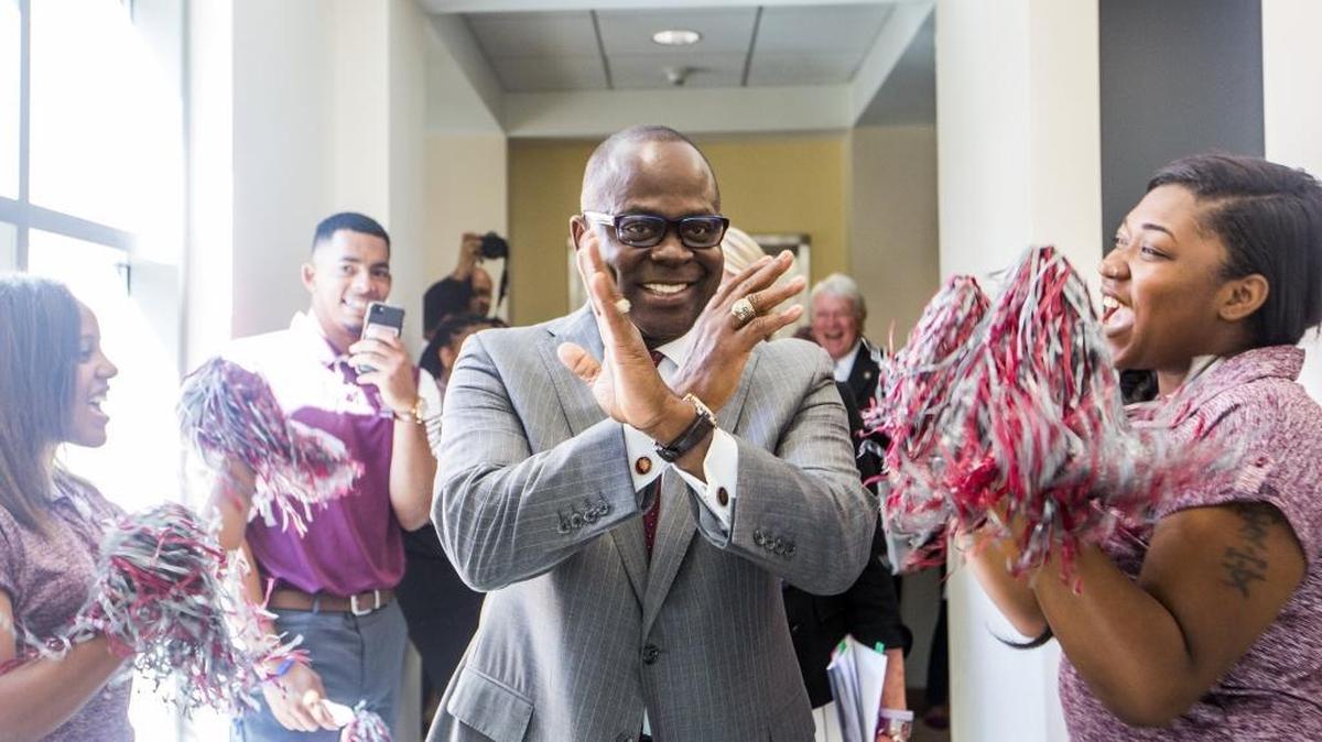 Johnson Akinleye is congratulated by students after being named the new chancellor of N.C. Central University on June 26, 2017, in Chapel Hill, NC.