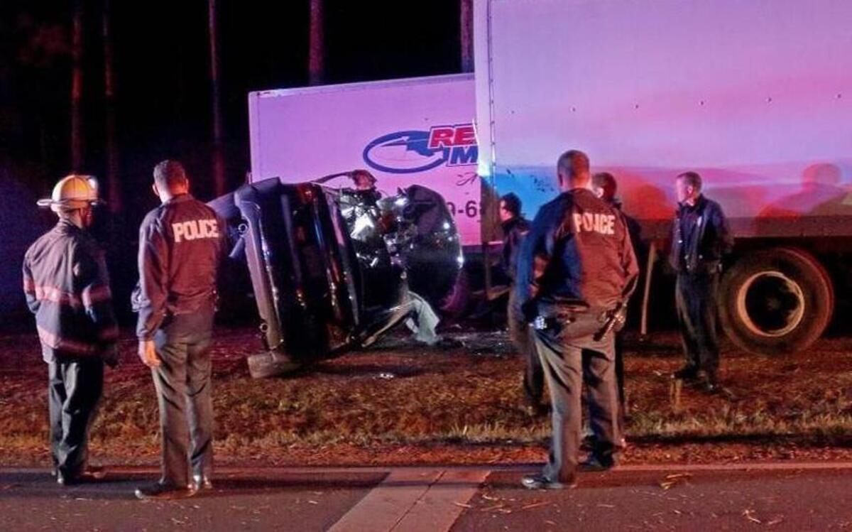 Durham police and other first responders are shown at the Riddle Road site of a fatal wreck involving a passenger car and a tractor-trailer on Jan. 26, 2017.