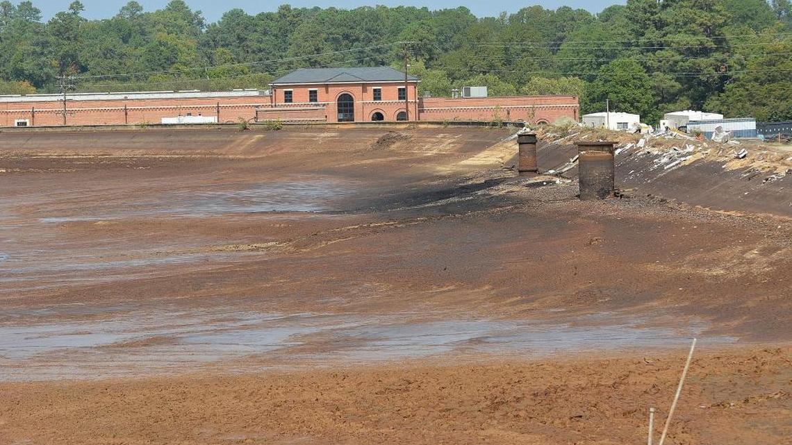 The 45 million gallon reservoir at the Williams Water Treatment is shown this week while being drained as part of a renovation and refurbishment process. The wrought-iron fence will be taken down, restored and reinstalled when the project is completed.