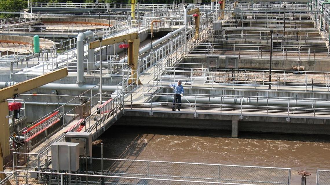 An OWASA employee checks one of the treatment tanks at the Mason Farm Wastewater Treatment Plant on Morgan Creek in southeastern Chapel Hill. Duke scientists found perfluorinated chemicals in a water sample taken from the creek near the Farrington Mill Road bridge, a few miles south of the plant.
