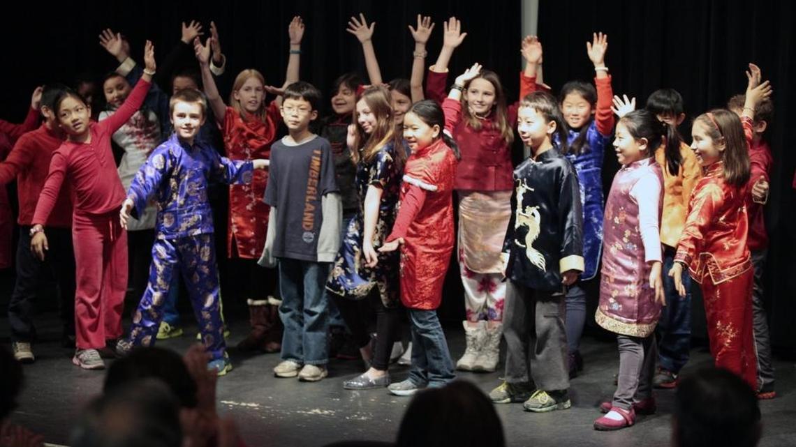 Glenwood Elementary Mandarin-English 4th grader perform a song welcoming the Chinese New Year, the Year of the Horse, at the Seymour Senior Center in Chapel Hill in this Feb. 3, 2014, file photo.