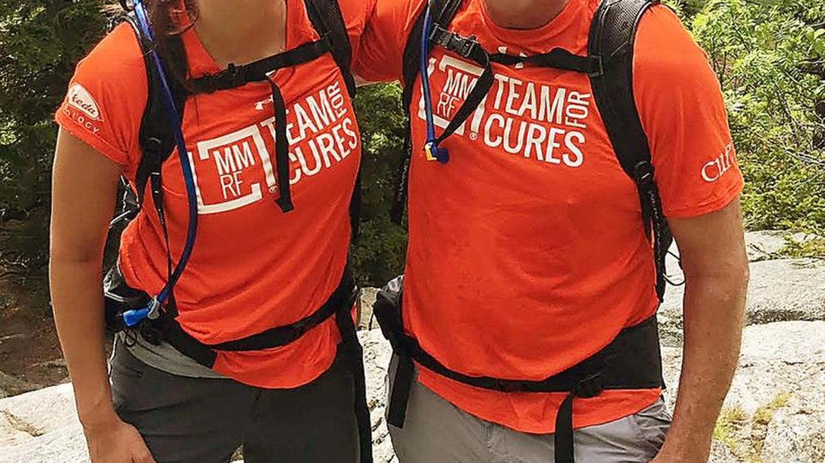 “She’s a great motivation to getting things going, getting things happening,” Jeff Monsein says of daughter Rachel Overcash, seen together on one of their practice climbs before tackling Mount Fuji in Japan.