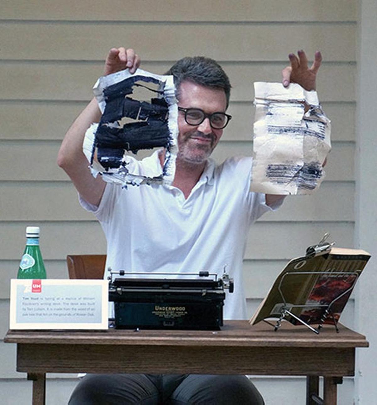 Los Angeles-based performance artist Tim Youd displays the finished re-creation of a famous book.