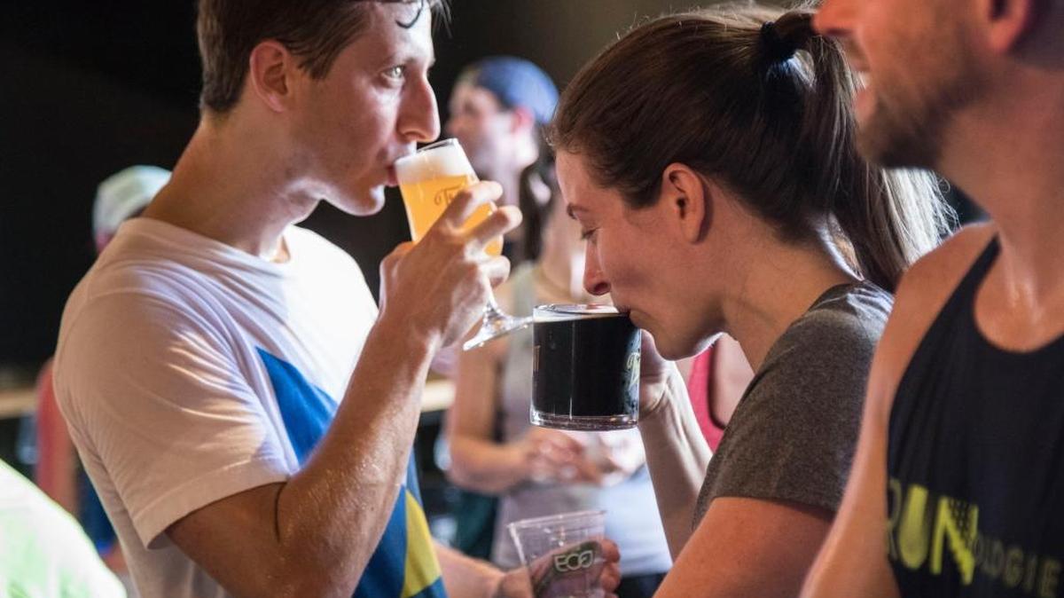 Alex Orocz, left, and Liz Tracy sip beers at Trophy Brewing & Taproom in Raleigh on Sunday, July 9, in celebration of North Carolina’s new Brunch Bill. The Chapel Hill Town Council voted Monday, July 10, to allow local restaurants and bars to serve alcohol on Sunday mornings.