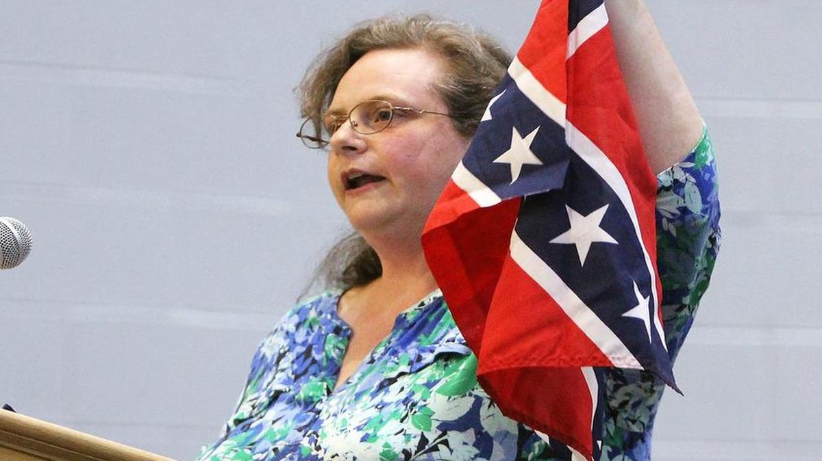 "Historical context and use of the symbol as harbinger of violence and murder is at issue here," Hillsborough resident Katherine Walker tells the Orange County Schools Board of Education Monday, April 24, 2017, at Stanback Middle School in Hillsborough, NC.