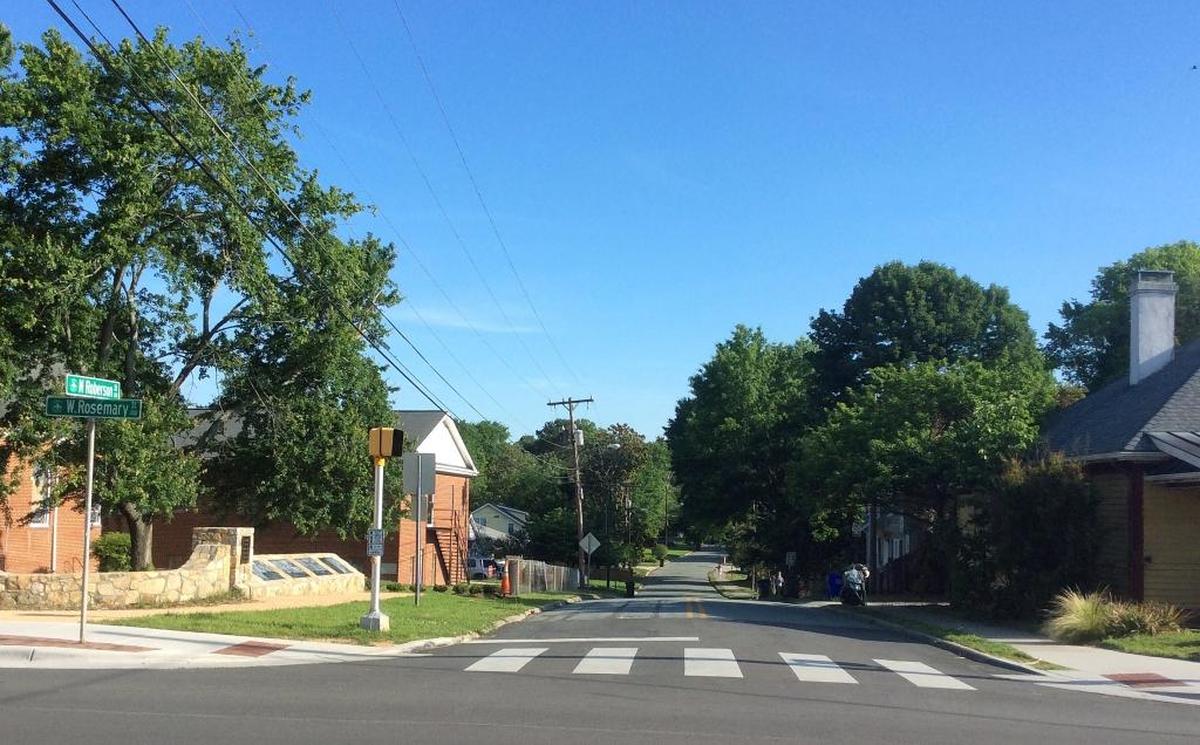 Northside is Chapel Hill’s historic African-American neighborhood lying directly north of West Rosemary Street. A wall depicting some of the community’s history stands at this corner of West Rosemary and North Roberson streets.