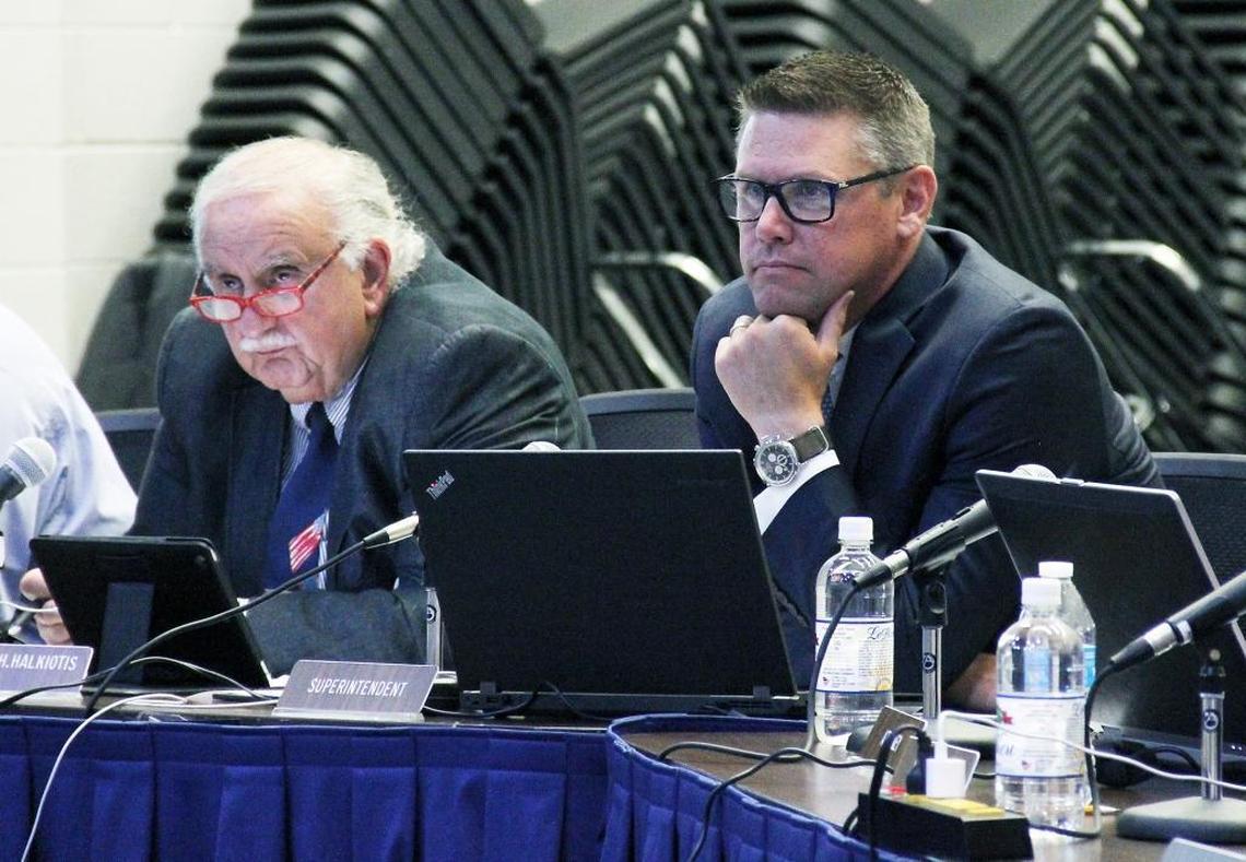 The cost of finding a new Orange County Schools superintendent to replace Todd Wirt (right, with board member Steve Halkiotis, will come out of the coming school year’s budget.