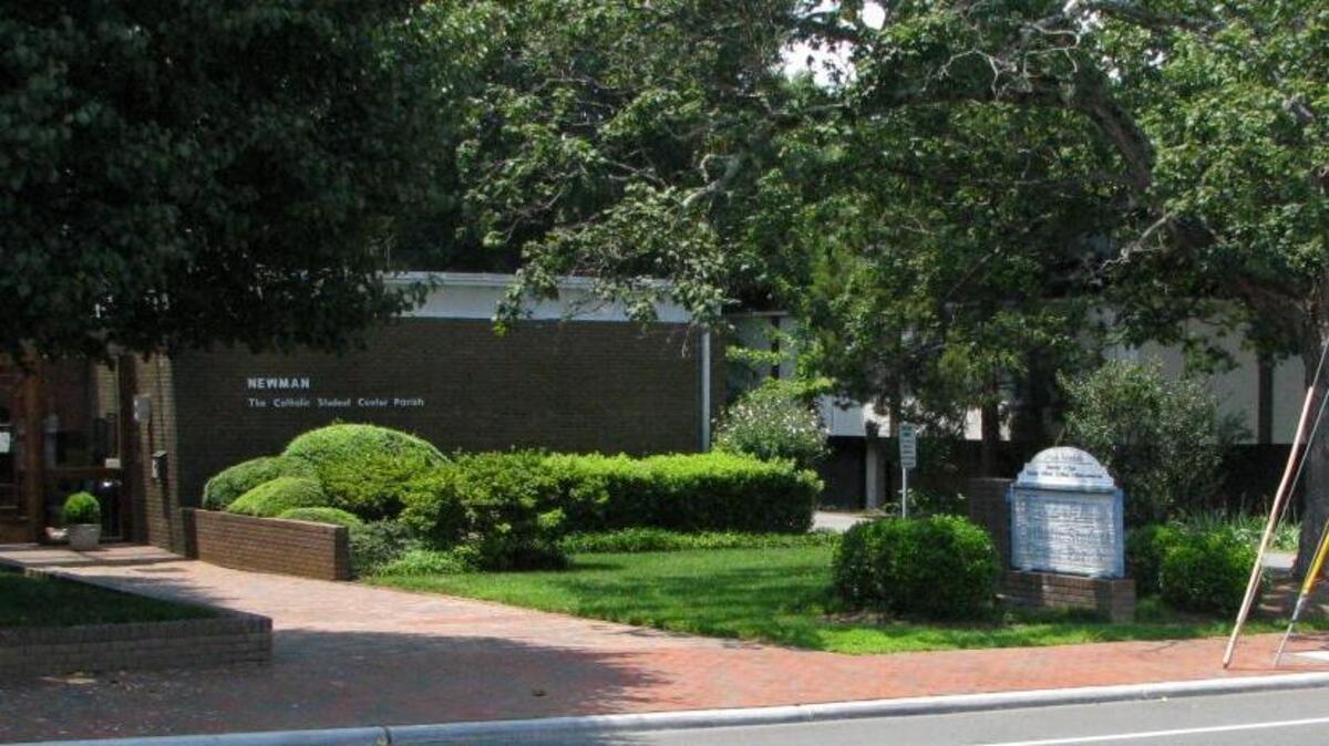 The Newman Center, at left, is located on Pittsboro Street on UNC’s campus in Chapel Hill. Pastor Justin Ross has said Newman Center ministries and outreaches were not affected by Brian Cansler’s embezzlement of over $134,000.