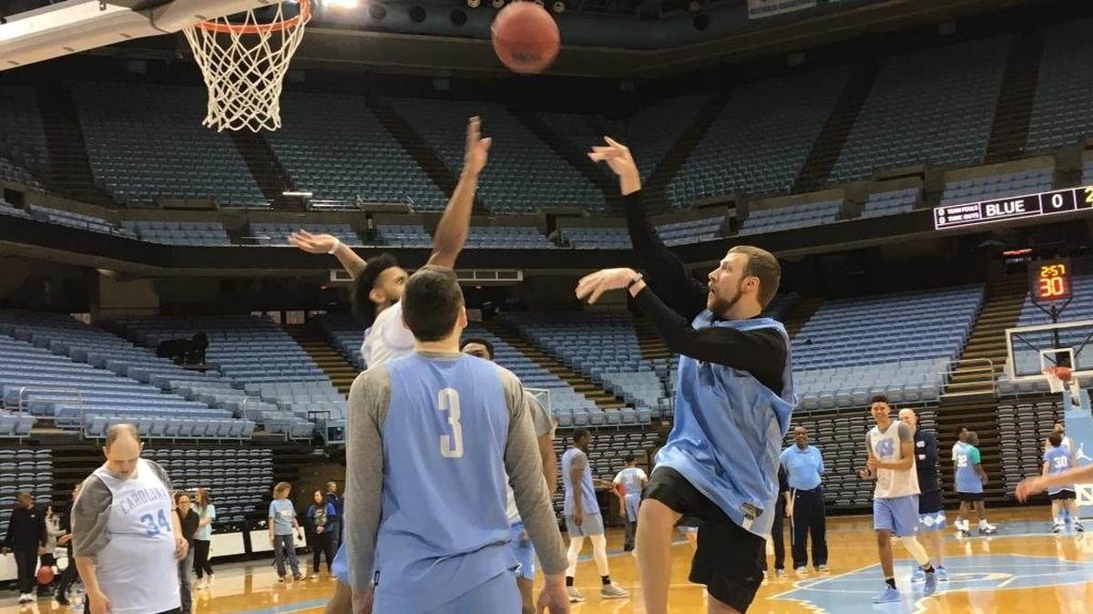 Chase Stroud shoots and makes a running jumper over the UNC basketball captain Joel Berry II during the 15th annual clinic for Special Olympics North Carolina athletes hosted by the UNC men’s basketball team.