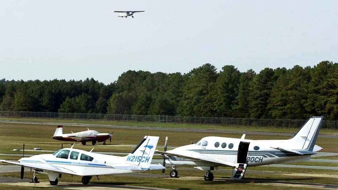 A Cessna takes off to the east, heading out over the town of Chapel Hill, from Horace Williams Airport in this file photo. UNC-Chapel Hill trustees said Thursday they want to close the airport regardless of whether the university develops a satellite campus called Carolina North on the property.