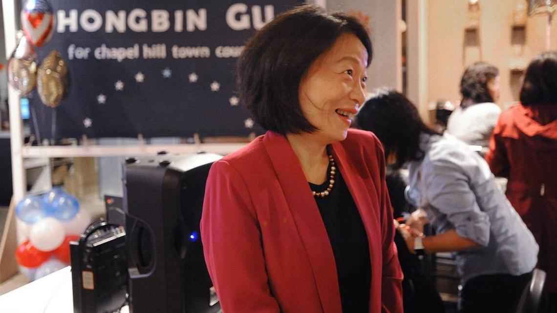 Candidate Hongbin Gu, with supporters at Red Lotus restaurant, finished first in the race for four Chapel Hill Town Council seats Tuesday, Nov. 7, 2017.
