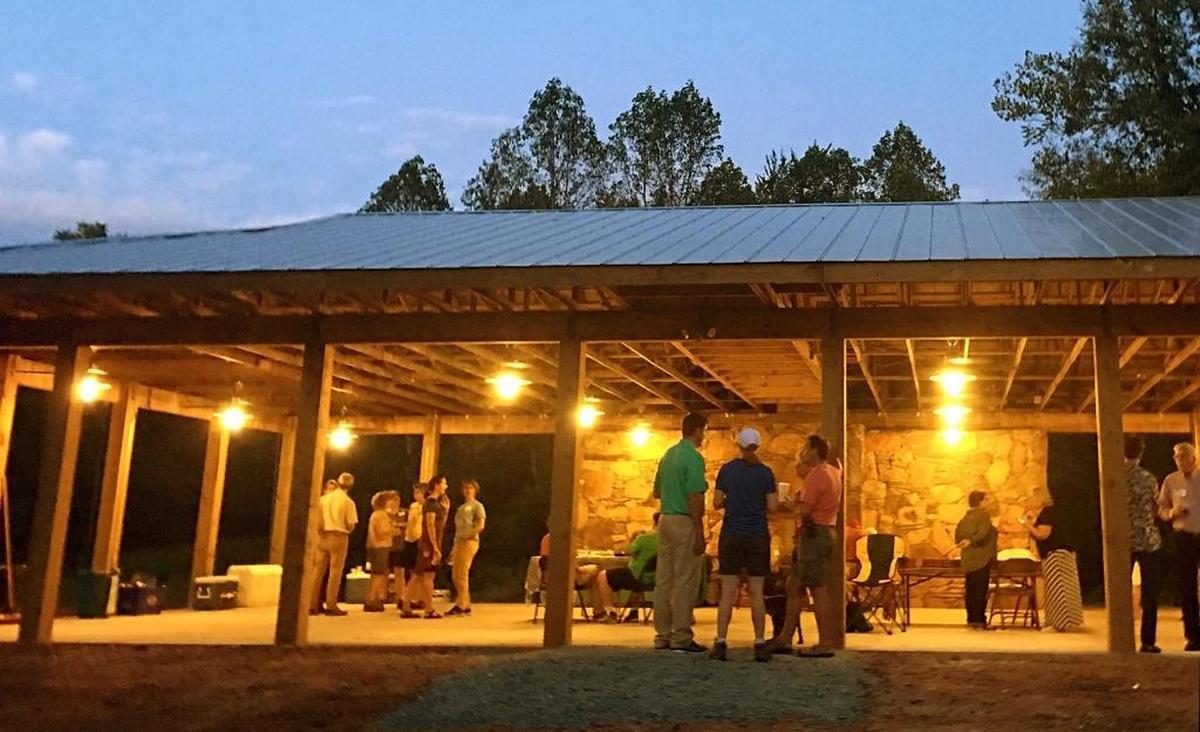 Eno River Association staff and volunteers built this open-air pavilion at the Confluence Natural Area last year. The pavilion features a fireplace built with stone from the foundation of an old house that used to be on the property.