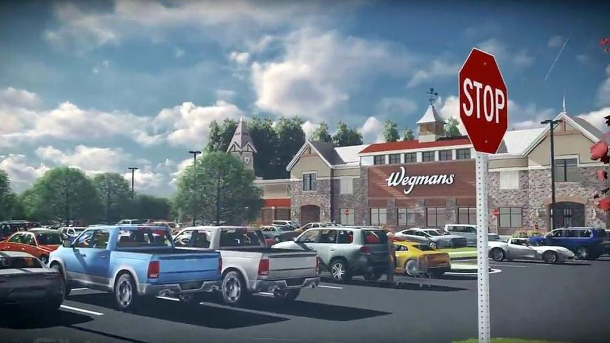The main entrance to a planned Wegmans Food Markets store on Old Durham Road would enter from a new roundabout just west of Cooper Street. The project includes a 130,000-square-foot store with up to 750 parking spaces in two lots.