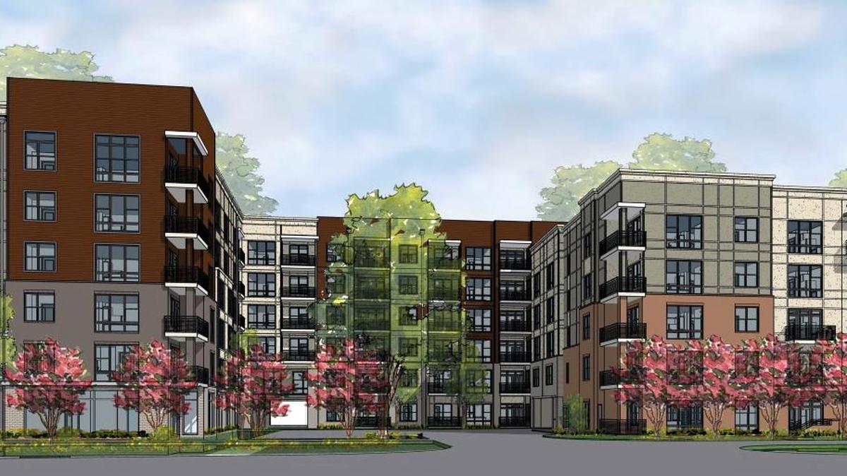 Ram Realty Services has proposed a central motor court for pickups and dropoffs and a pedestrian passageway (white area) bisecting a single Fordham Boulevard Apartments building. Community Design Commission members suggested creating two smaller buildings with a more obvious pedestrian cut-through instead.