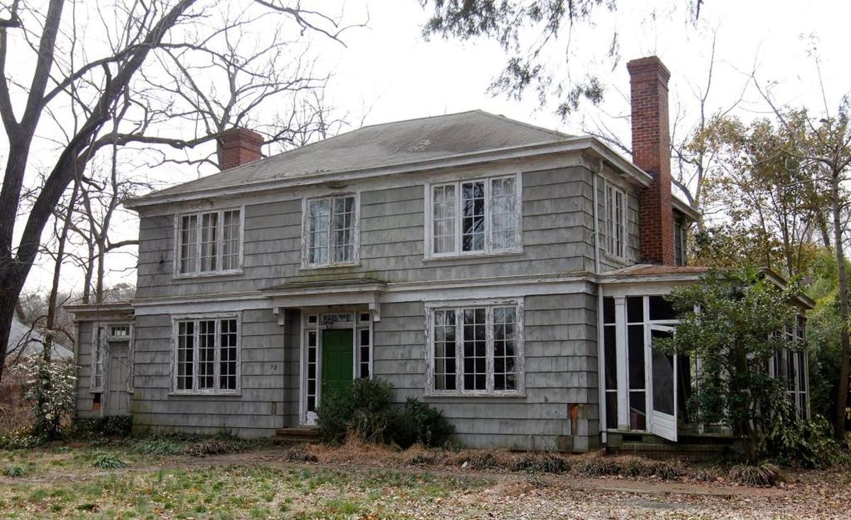 The late 1920s home at 704 Gimghoul Road in Chapel Hill was showing its age when former owners Tanner and Mimi Hock sought a demolition permit in 2013. The Hocks eventually sold the house to longtime Gimghoul neighborhood residents Bob and Virgina Buysse.