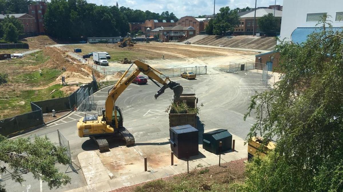 Workers are demolishing Fetzer Field, UNC-Chapel Hill's longtime soccer stadium, ahead of building a replacement and an adjoining football practice facility that between them will cost about $67.4 million.