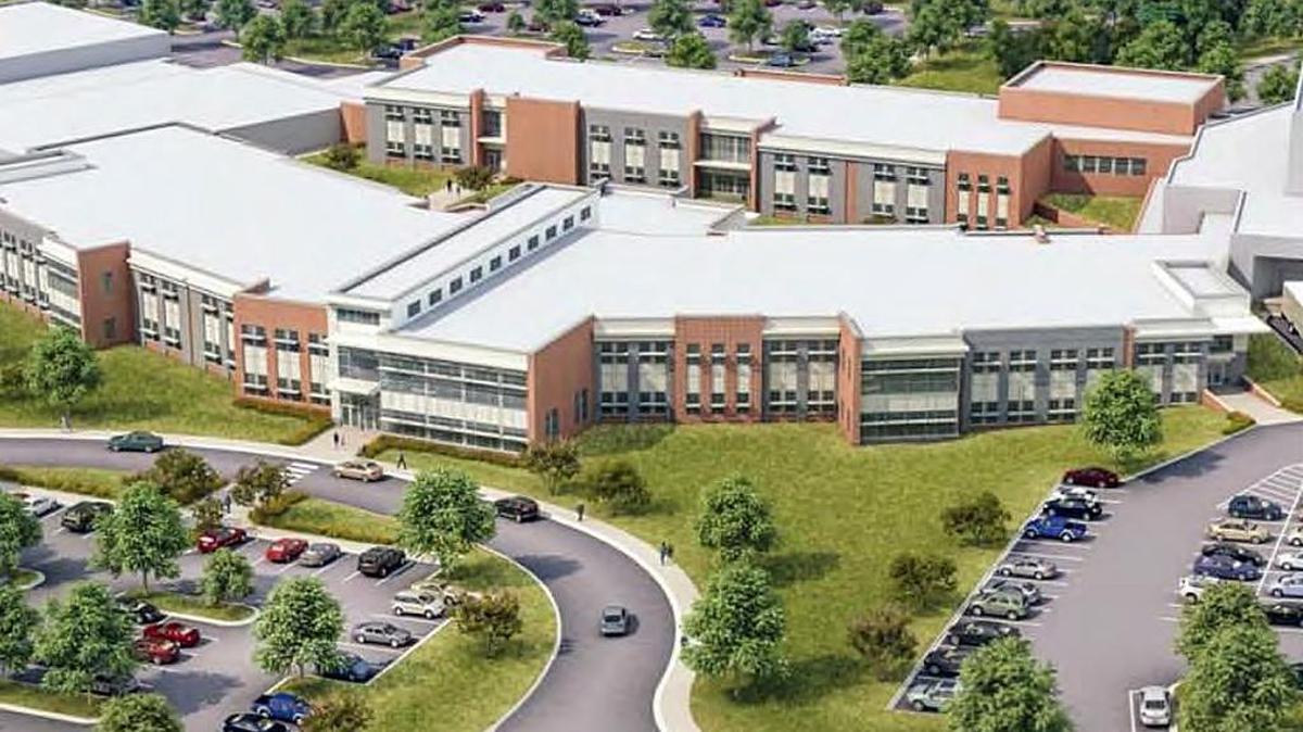 Chapel Hill-Carrboro City Schools officials say Triangle construction cost increases could add another $15 million to $20 million to a $52.4 million plan to renovate and rebuild parts of Chapel Hill High School (pictured in this artist’s rendering).