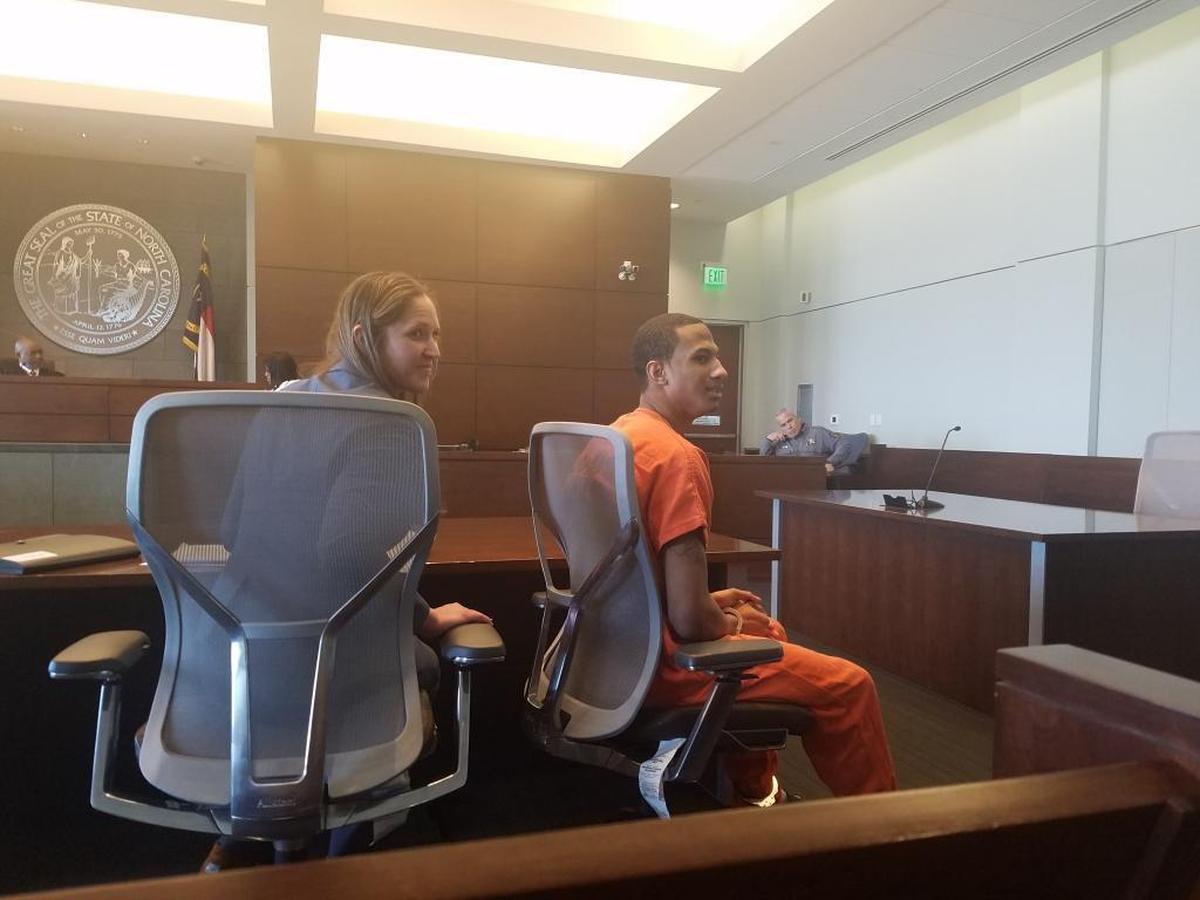 Defense attorney Allyn Sharp, left, and her client Chris Wiggins, who is charged with murder, after Chief Resident Superior Court Judge Orlando Hudson unsecured his bond.