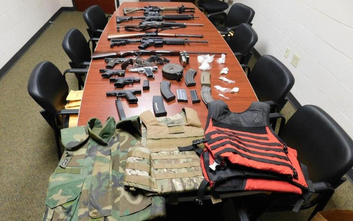 The Orange County Sheriff’s Office said these 13 guns, three body-armor vests, hundreds of rounds of ammunition and more than 90 grams of cocaine were in a home they searched Thursday, June 29, 2017.
