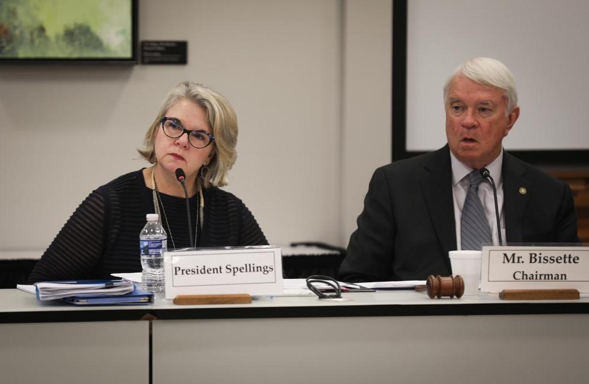 UNC System President Margaret Spellings, left, and UNC Board of Governors Chairman Louis Bissette, listen to board member Tom Fetzer propose a resolution to reduce tuition and fees. during a meeting held Thursday, Sept. 7, 2017 in Chapel Hill.