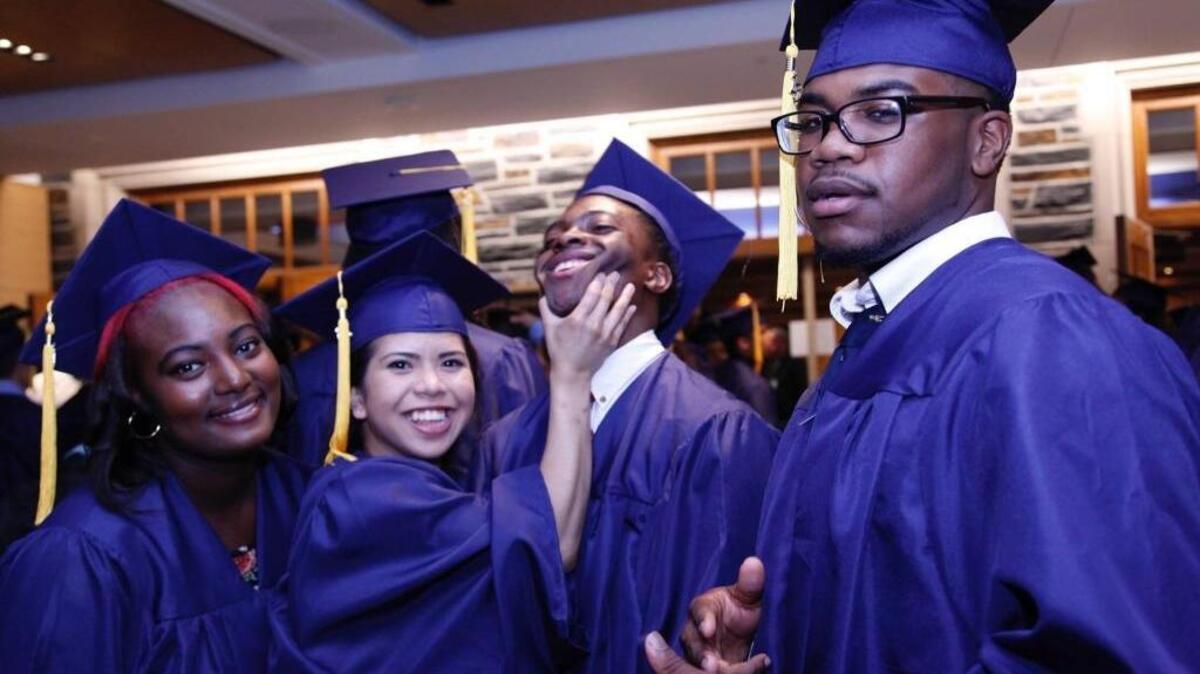 Northern High School graduates clown around during their 2016 commencement at Cameron Indoor Stadium.