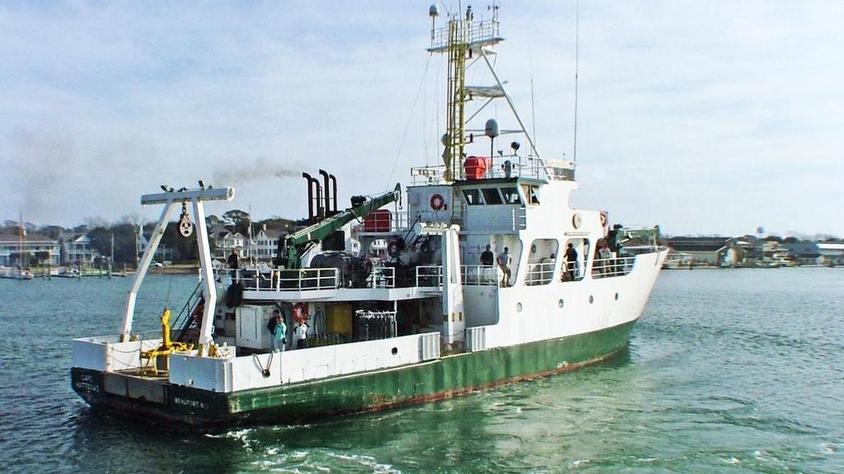 The Cape Hatteras turns before docking in 2013 at the Duke Marine Lab dock at Beaufort, ending its final voyage.