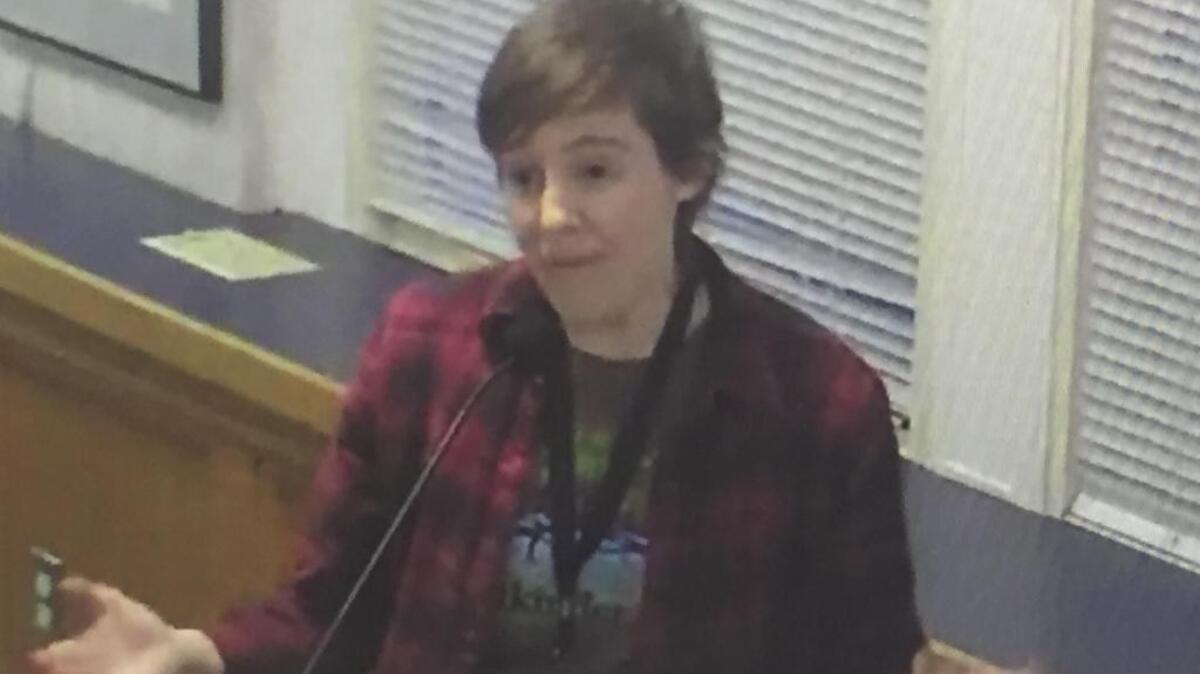 Northern High School science teacher Holly Hardin tells school board last week that the district's shortage of substitute teachers is disrupting her life.