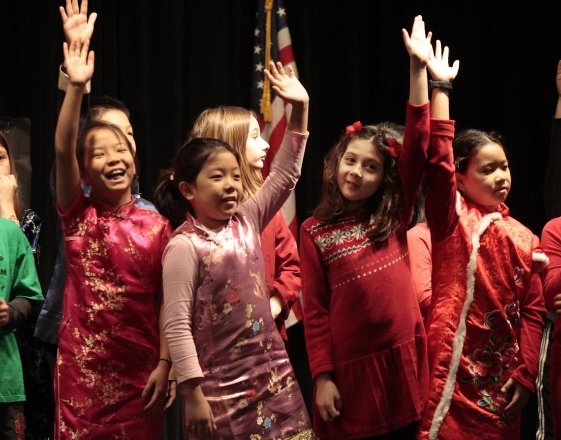 Students in Glenwood Elementary School’s Mandarin/English program visit the Seymour Center in Chapel Hill to perform a song and short play in Chinese and English for the seniors.