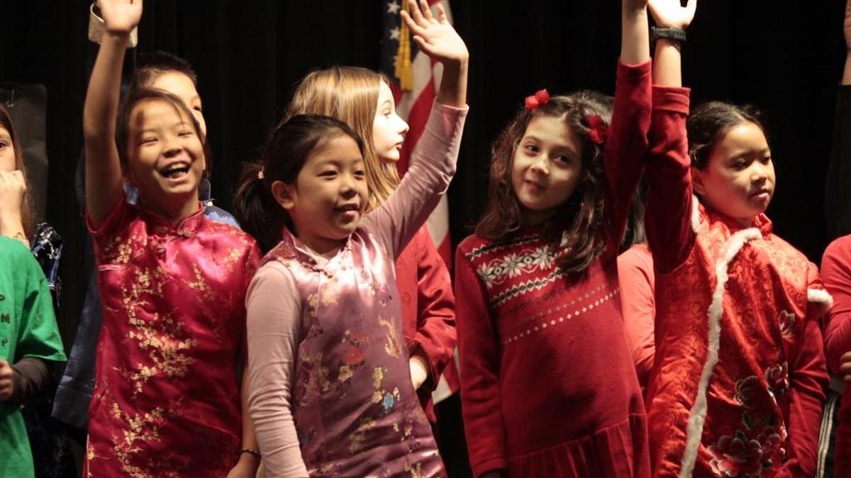 Students in Glenwood Elementary School’s Mandarin/English program visit the Seymour Center in Chapel Hill to perform a song and short play in Chinese and English for the seniors.