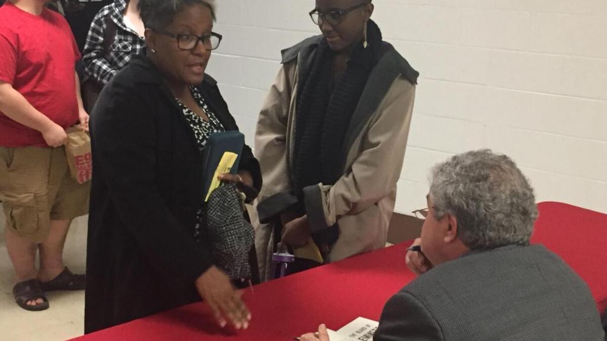 Author Tim Tyson talks with Karen Jones and April Jones at Wednesday's JHS Distinguished Speaker Series.